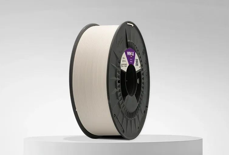 Spool of Winkle ABS Filament Natural 1,75mm 1kg on a platform and gray background