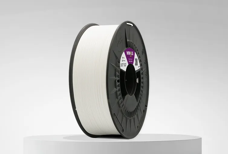 Spool of Winke PETG Filament Glacier White 1,75mm 1kg on a platform and gray background