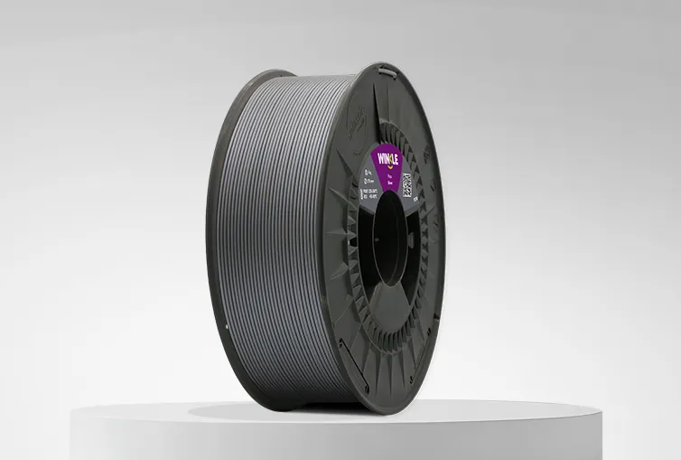 Spool of Winke PETG Filament Silver 1,75mm 1kg on a platform and gray background