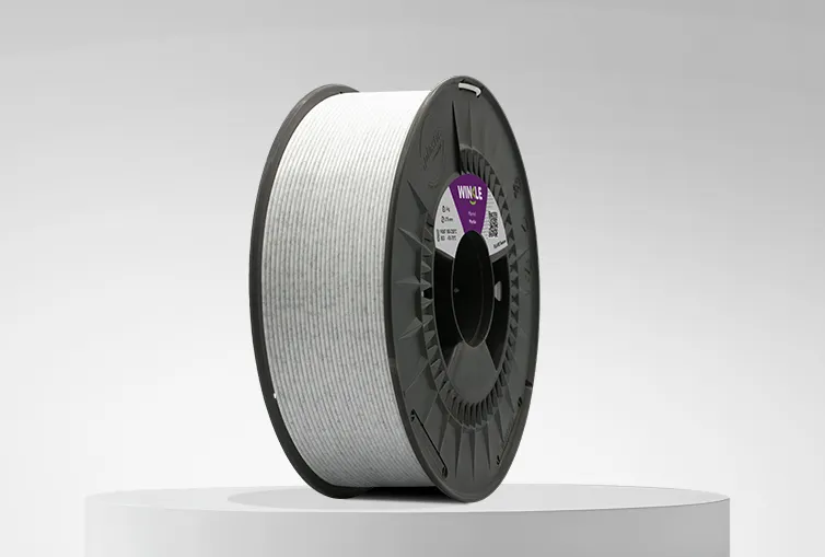 Spool of Winkle PLA HD Filament Texture Marble 1,75mm 1kg on a platform and gray background