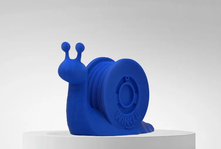 Figure 3D printed with Winkle PLA HD Filament Pacific Blue 1,75mm 1kg on platform and gray background