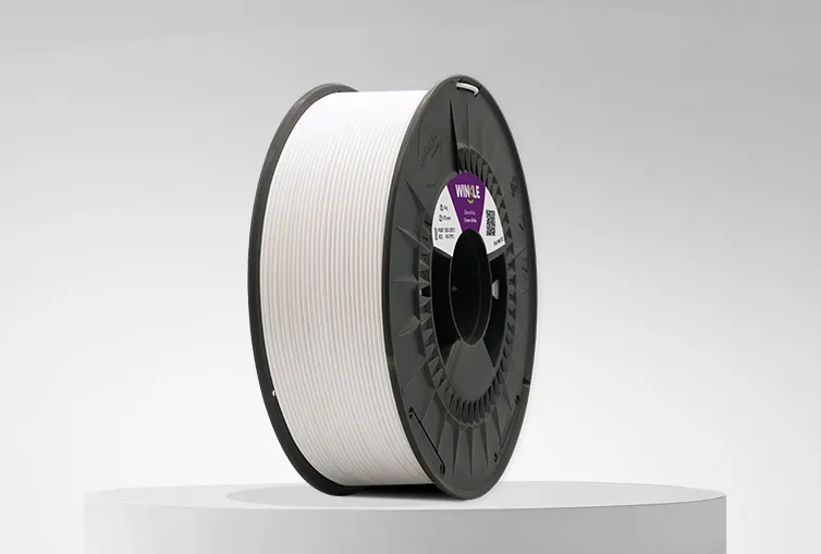 Spool of Winkle PLA Matte Filament Cream White 1,75mm 1kg on a platform and gray background